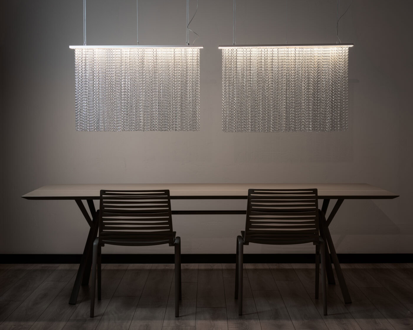 Anima pendant lights above a dining table